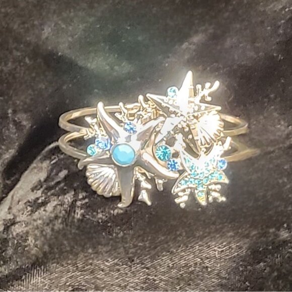 Hinged Starfish and Seashell Bracelet with Blue Rhinestones - Picture 2 of 11